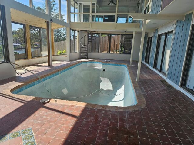 Before and after shots of an indoor pool, we recently did. New travertine,tile, and pebble finish. #plastertechjax #stonescapes